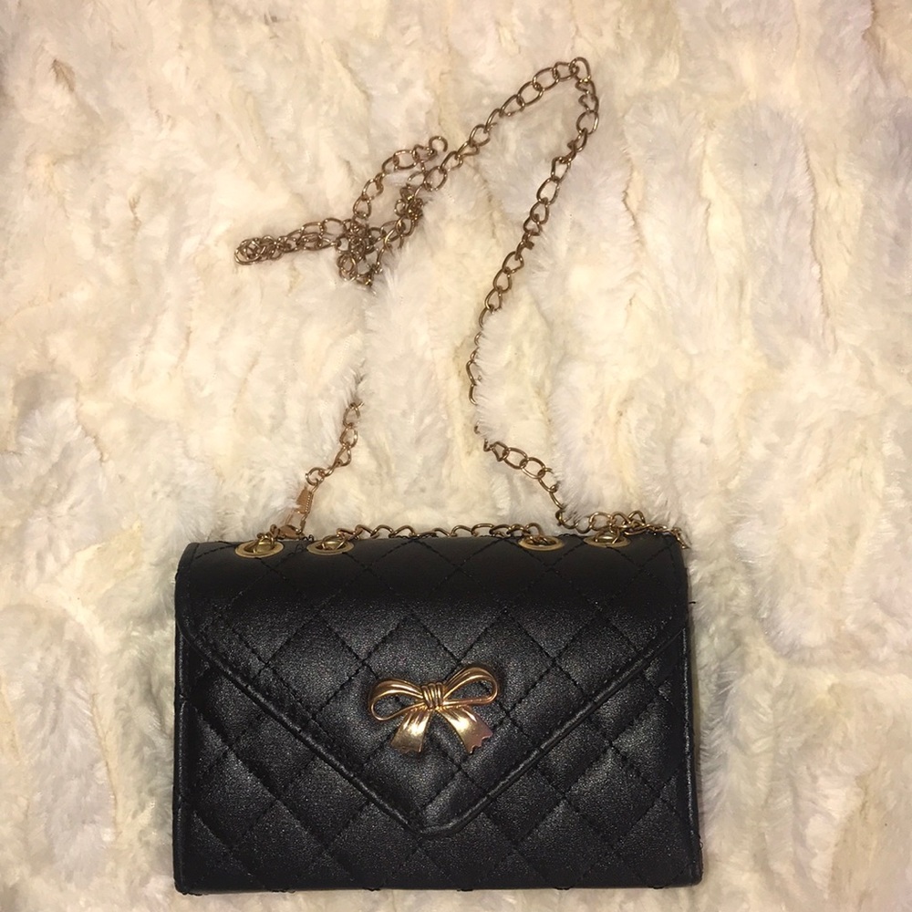 Quilted bow chain purse